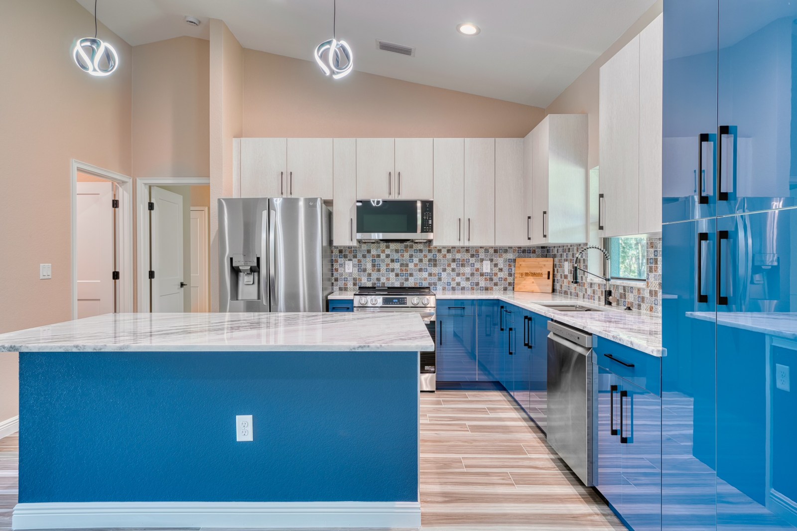 Custom Home with Statement Blue Kitchen